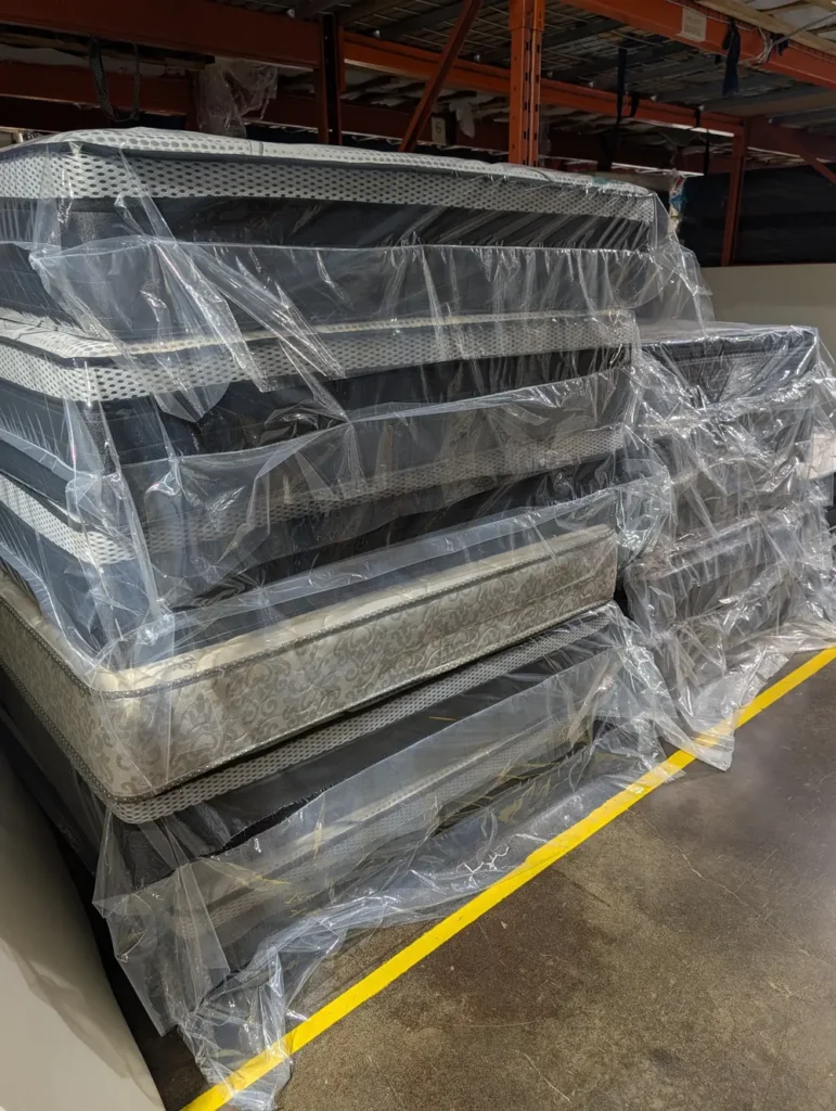 Mattresses in Aurora — wrapped in-stock inventory ready for factory-direct delivery