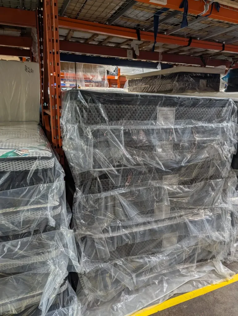 Mattresses wrapped and stocked at our factory-direct warehouse for Richmond Hill delivery